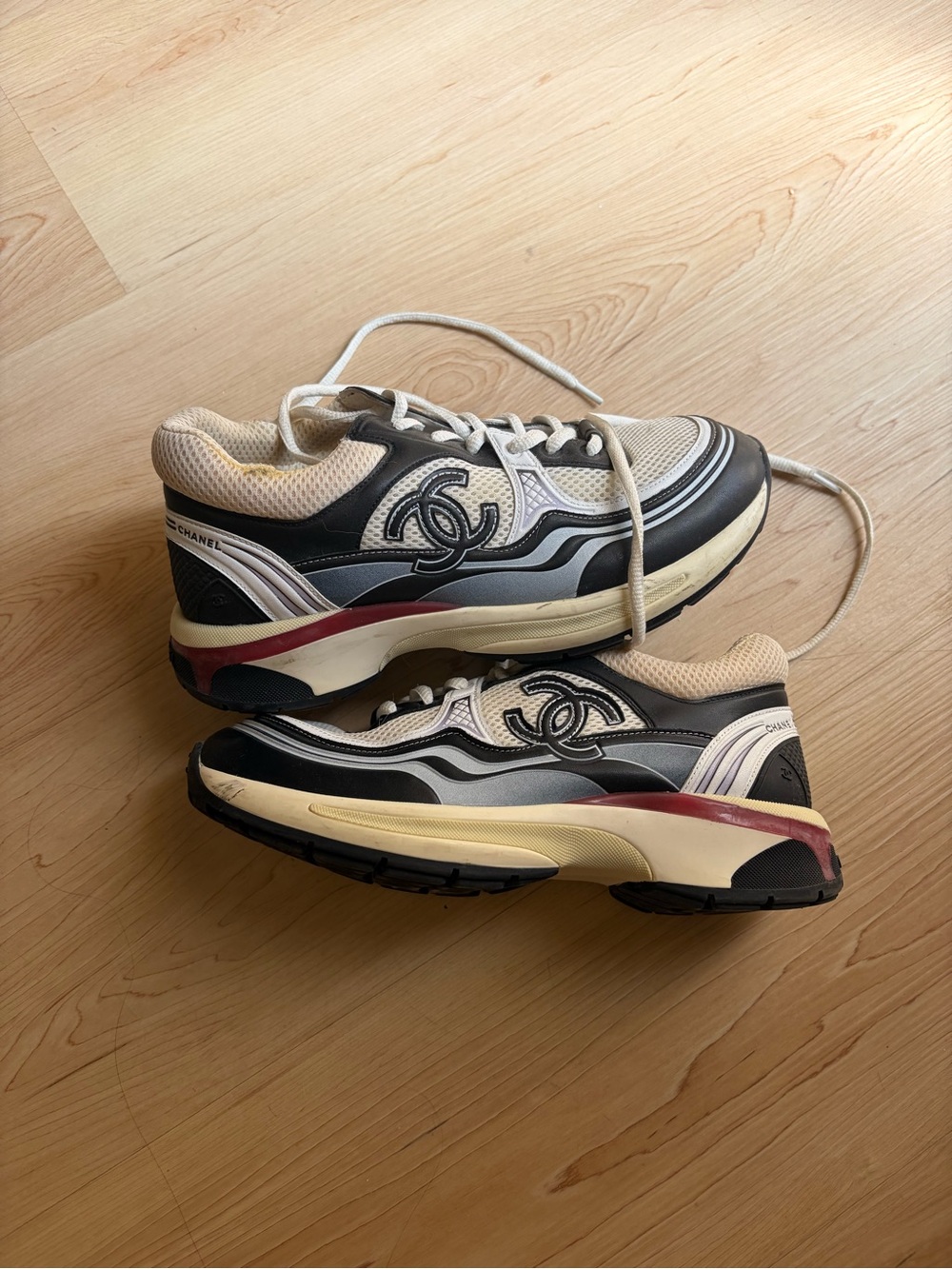 CHANEL Black, White & Red women’s  Layered Leather Sneakers